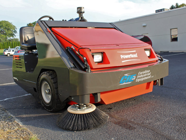 PowerBoss Armadillo 10X Sweeper in a parking lot