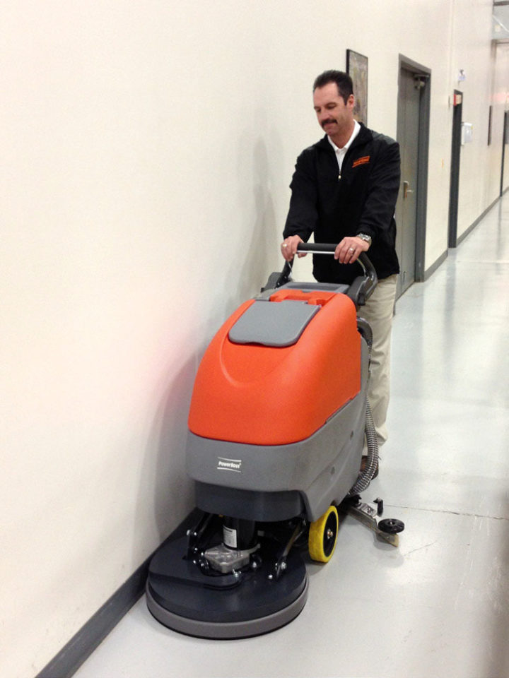 Cleaning a hallway floor with a PowerBoss Phoenix 20 Scrubber