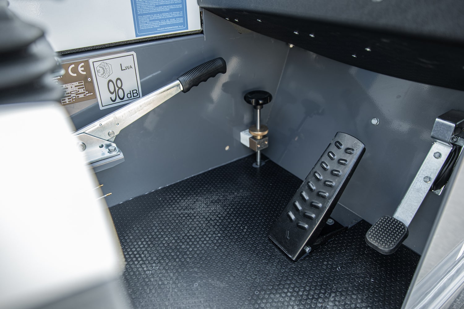 A Dulevo 120 sweeper's pedals.