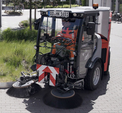 Hako Citymaster 1650 Sweeping a Brick Path