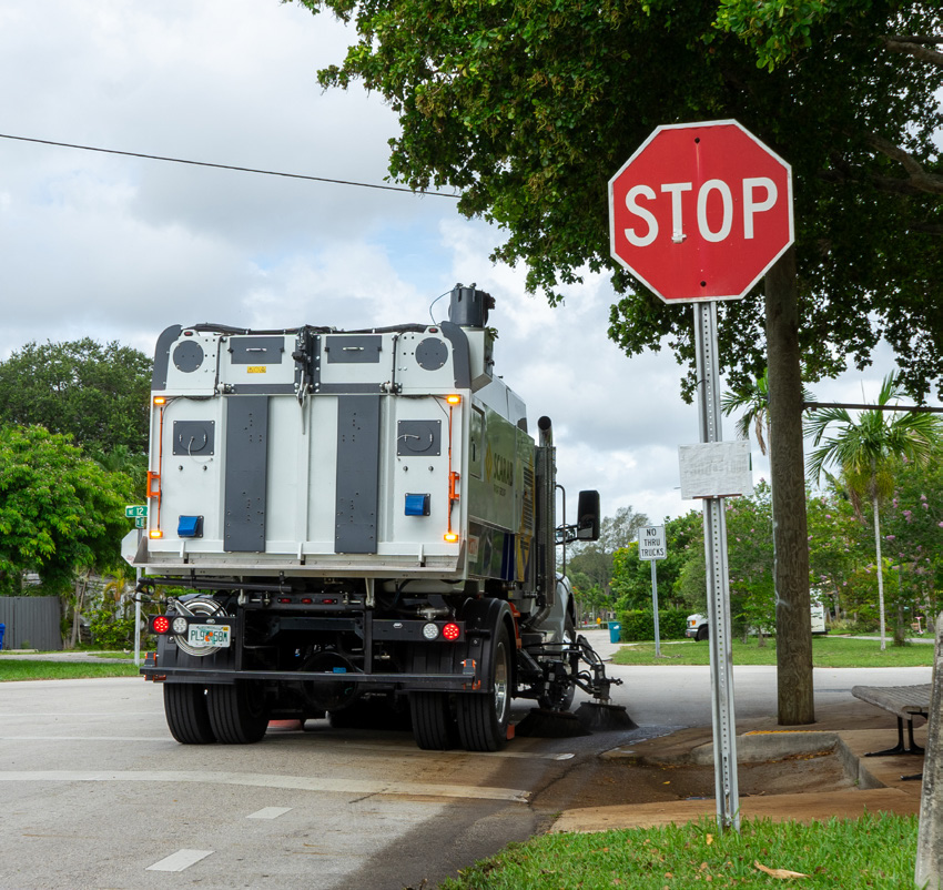 Scarab Maven 65 Street Sweeper on Suburban Road, Rear Angle